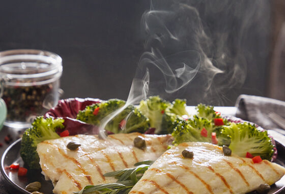 Sea bream fillet grill marked precooked